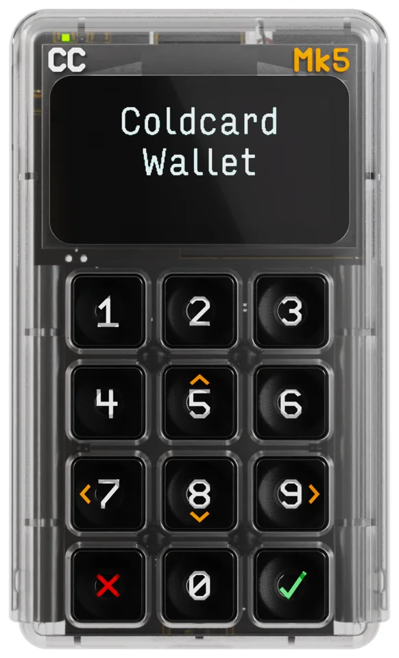 COLDCARD Mk5 front with its clear housing, startup message and twelve keypad keys.