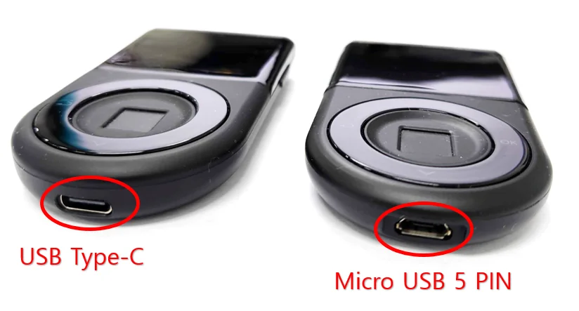 Manufacturer comparison of DCENT Biometric Wallet ports: USB-C on the left and older Micro-B 5-pin on the right, marked with red circles.