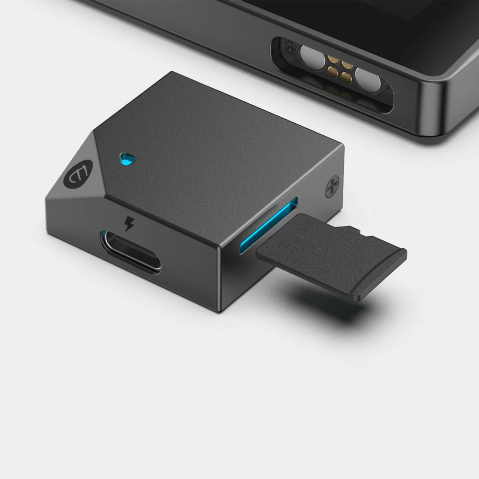 ELLIPAL’s rendering shows Mini’s bottom contacts above a separate adapter with a USB-C power port and microSD card slot.